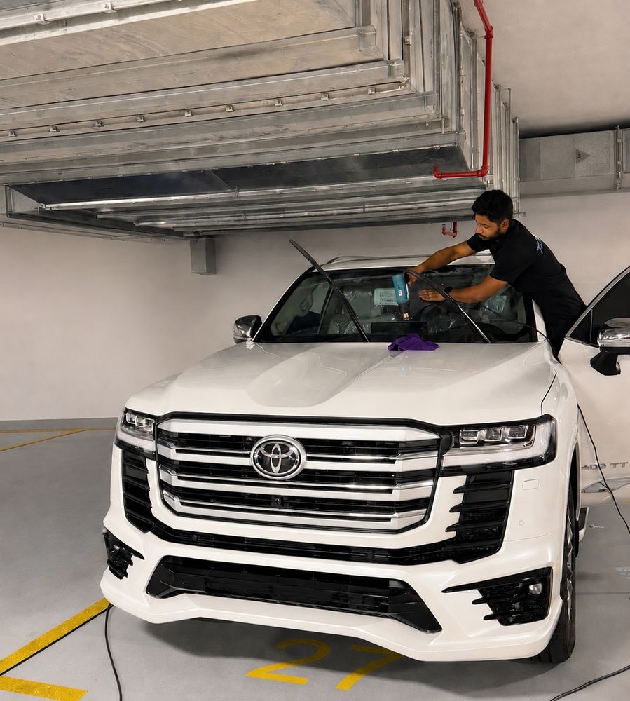Tint specialist with 15+ years experience installing windshield film